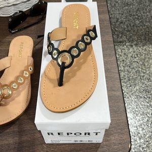 Report brand purchase from Macys. Never worn. Black with gold detail.